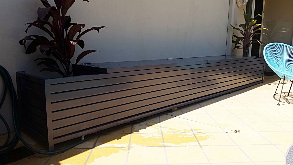Pool area storage and filter cover Insular Patios & Fencing