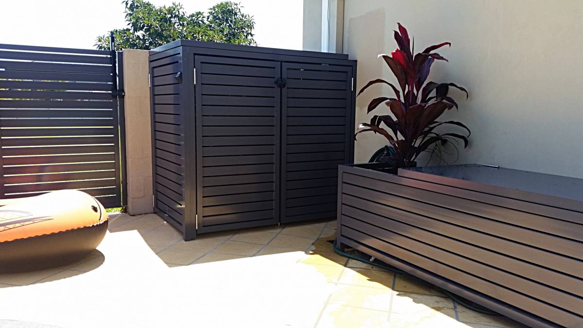 Pool area storage and filter cover Insular Patios & Fencing